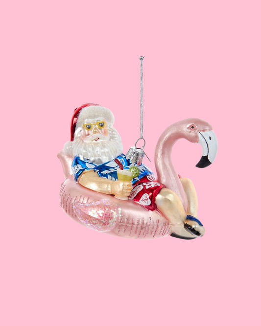 Noble Gems™ Glass Santa In Flamingo Pool Float Ornament