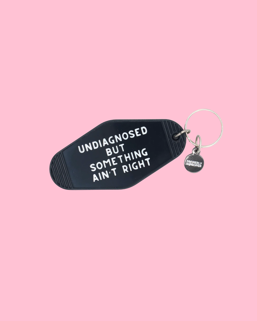 Something Ain't Right Hot Stamped Motel Keychain