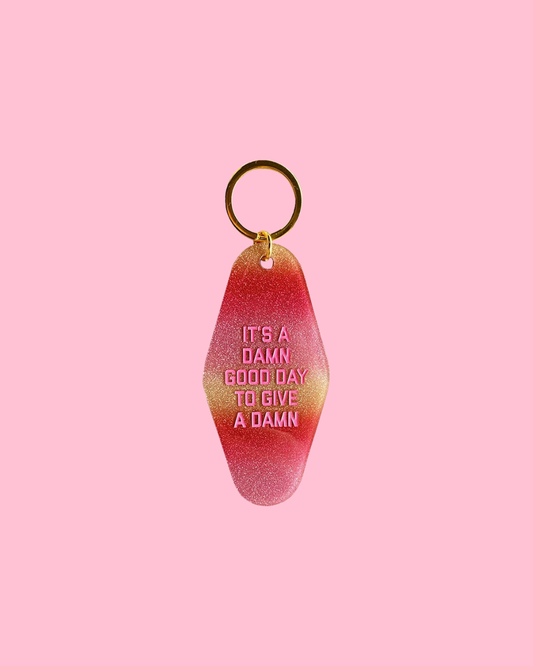 It's a Damn Good Day to Give a Damn Ombre Motel Keychain