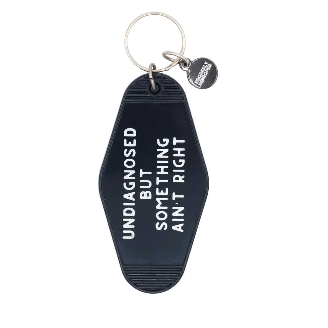 Something Ain't Right Hot Stamped Motel Keychain