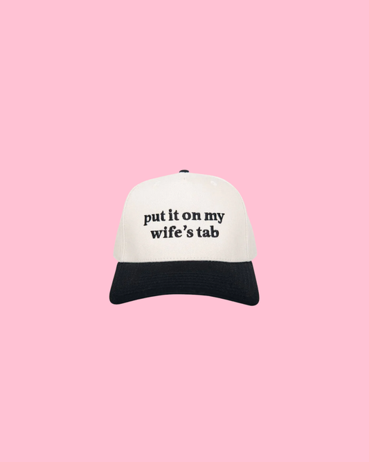 Put It On My Wife's Tab Trucker Hats