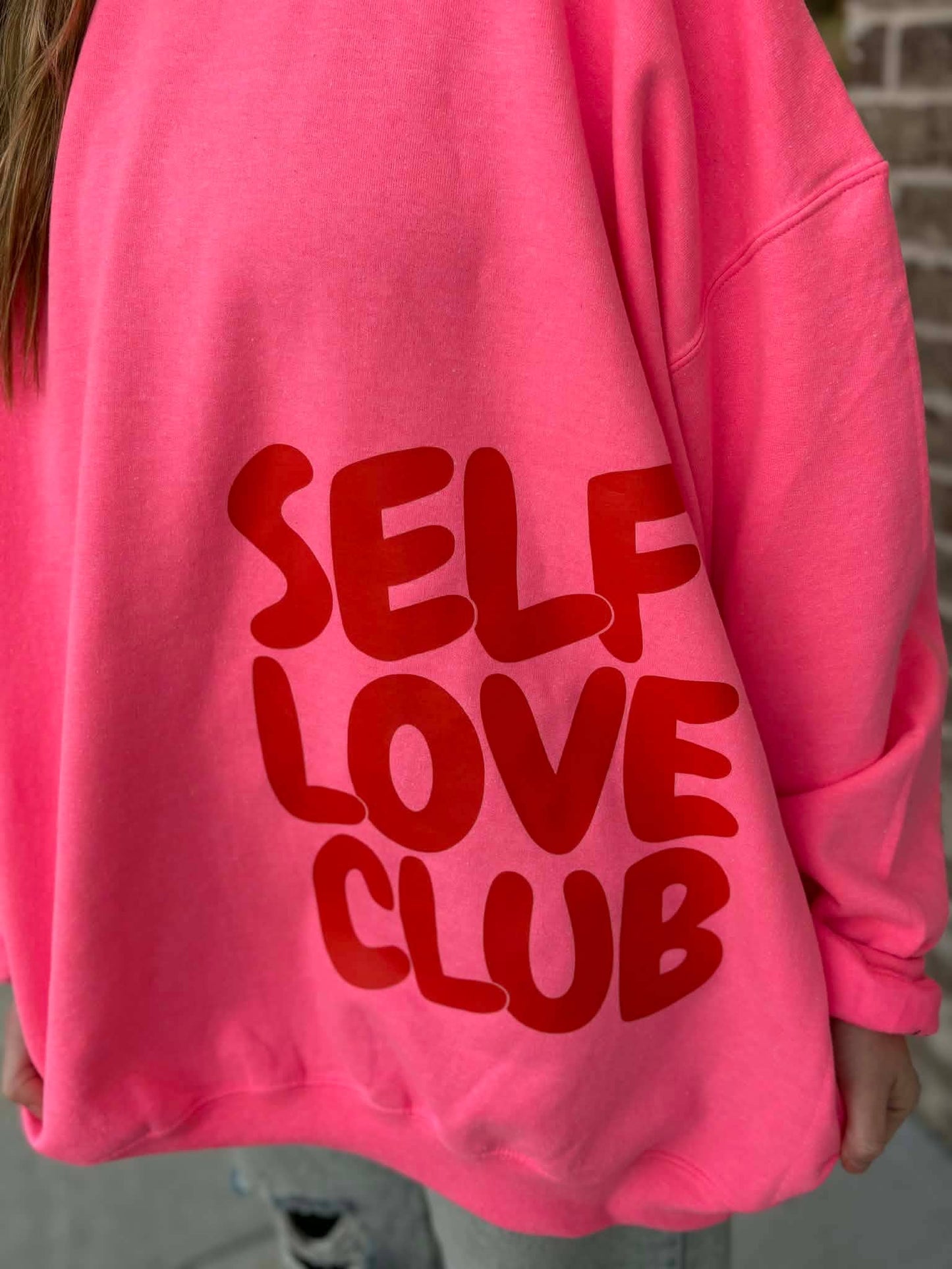 SELF LOVE CLUB SIDE PLACED SWEATSHIRT